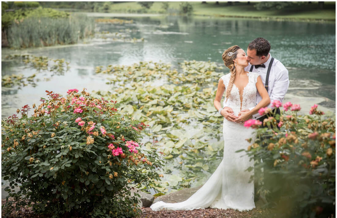 kissing by the flowers and lake