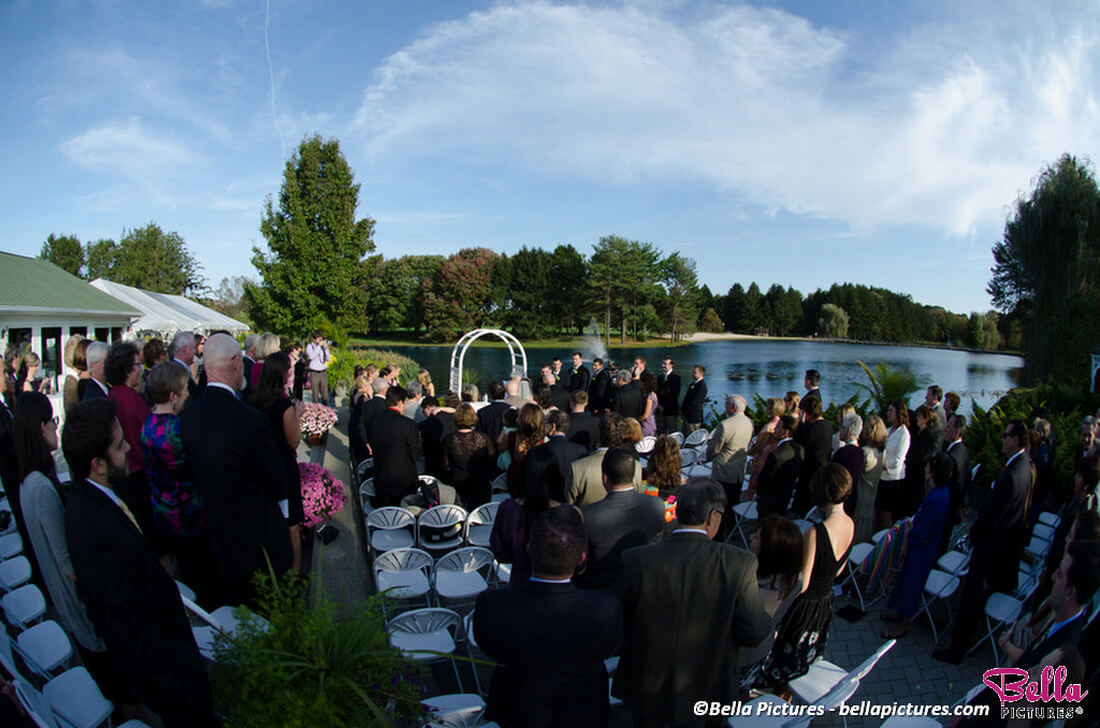 guests at lakeside wedding ceremony